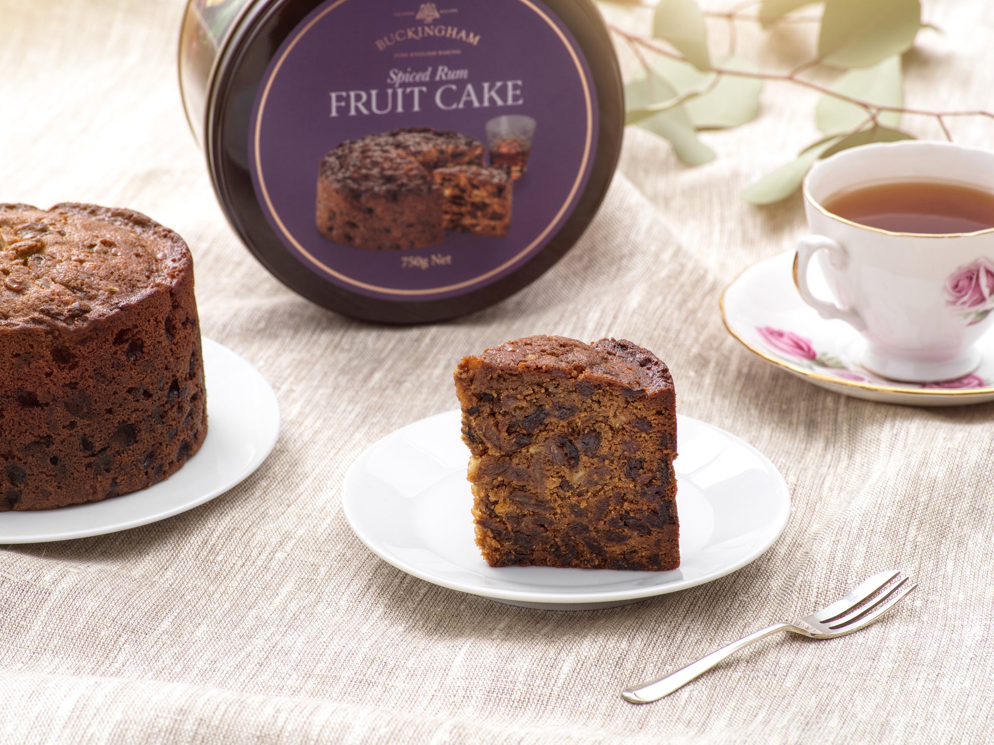 Slice of rum cake and cup of tea.